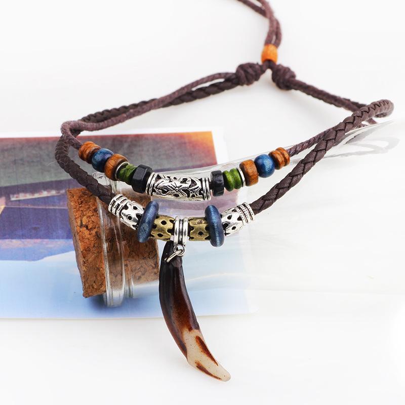 Wolf Tooth Amulet Necklace - Buddha Walks Shop